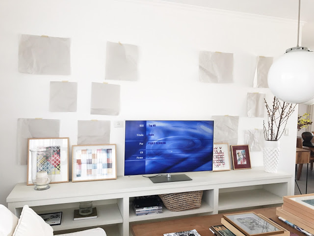 how to assemble a wall of paintings